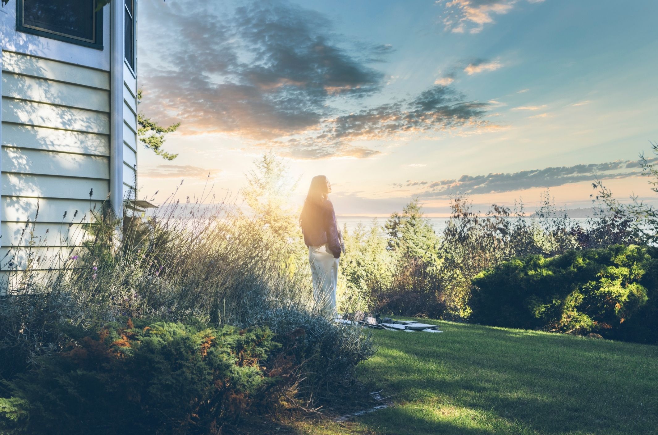 young asian woman with major depressive disorder watching sunrise