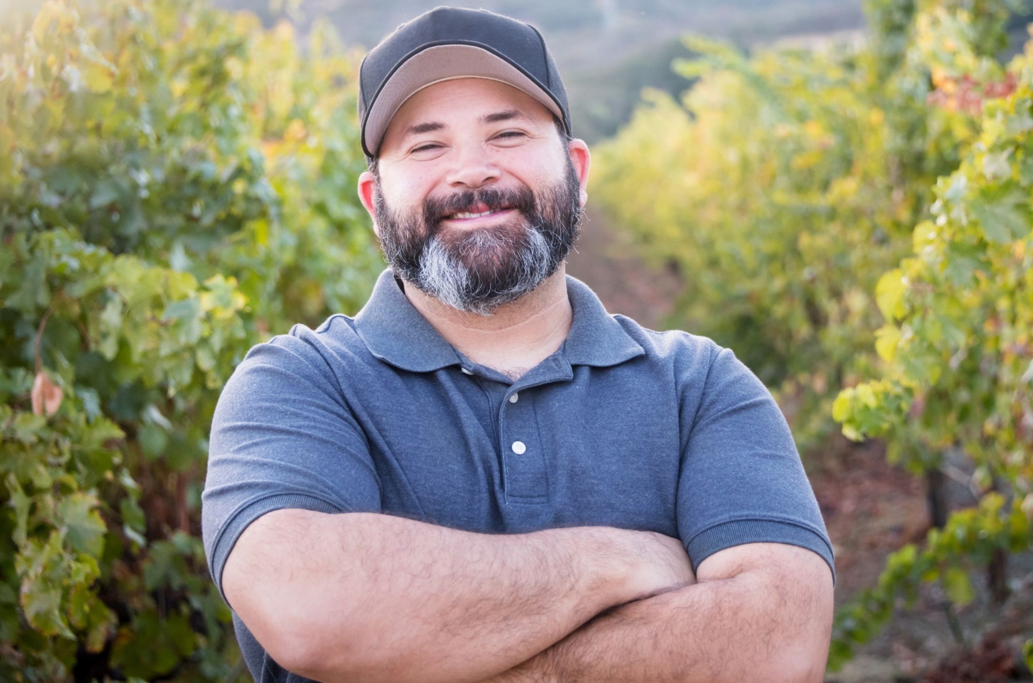 man smiling outdoors after learning how to stop rumination